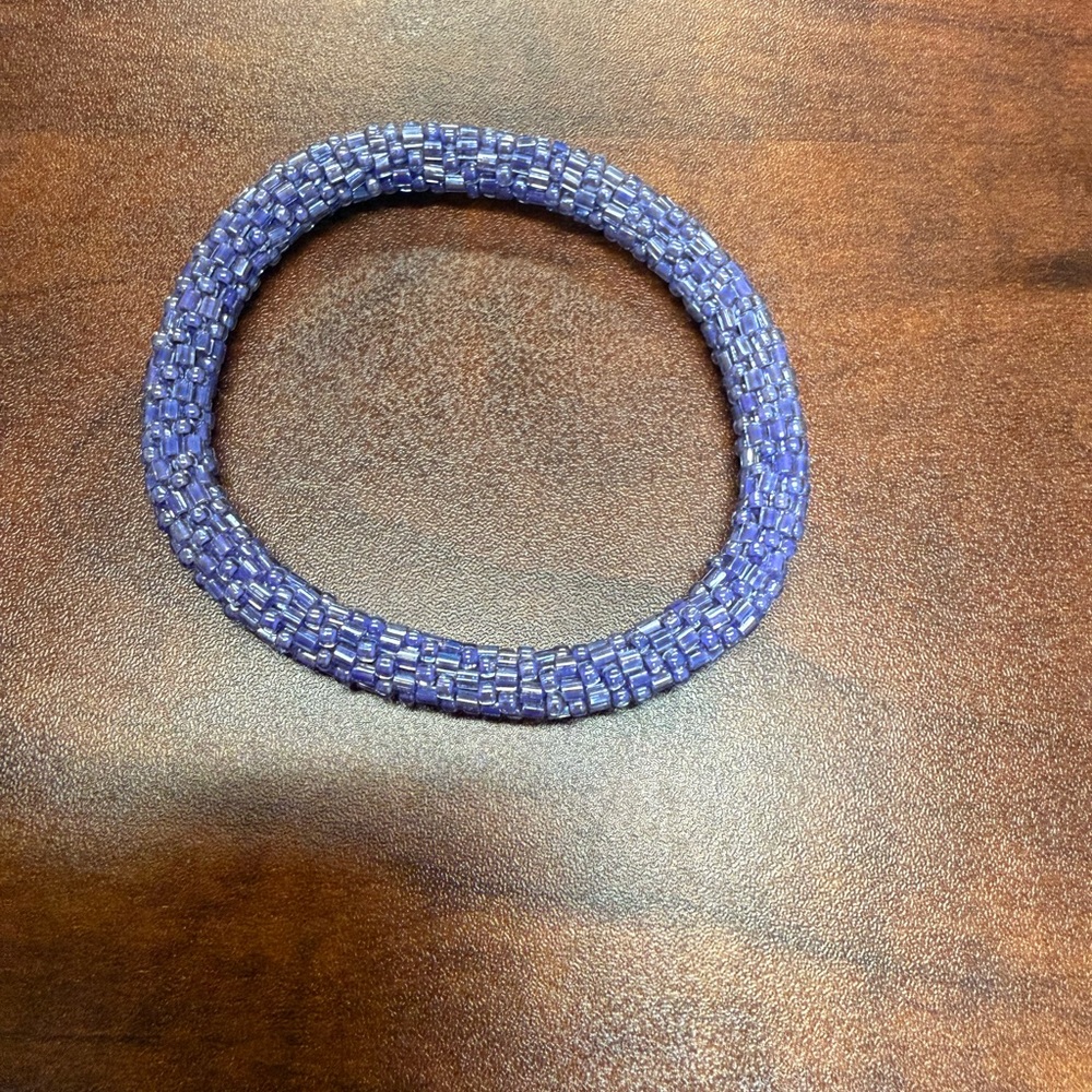 Elegant Lily and Laura Purple Beaded Bracelet. Handcrafted in Nepal.